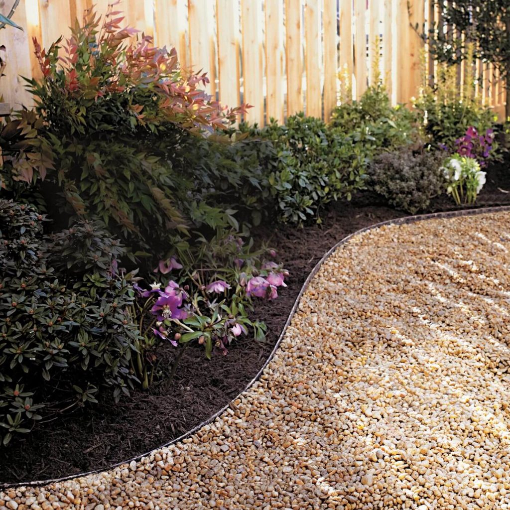 Create a gravel barrier or wood chip 